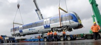 CAF Class 4000 train being lowered by crane